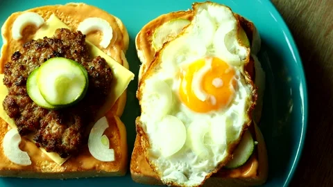 Breads with egg and patty topping, in door  Chiangmai  Thailand. Stock Footage 247452338