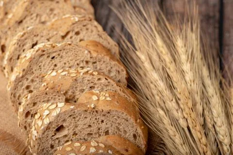 Breads sliced and wheatgrass on the sack Stock Photos