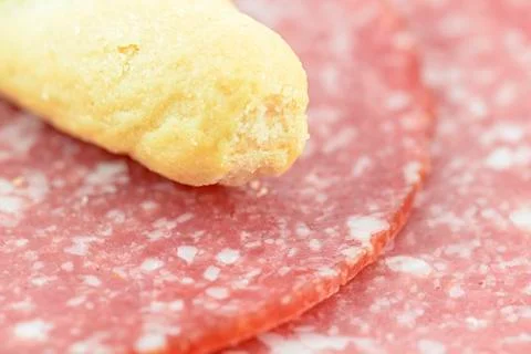 Breadstick and salami Photos
