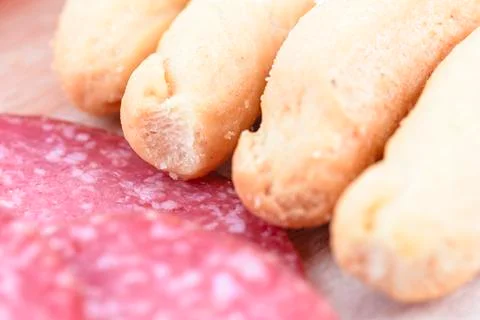 Breadstick and salami Stock-Fotos