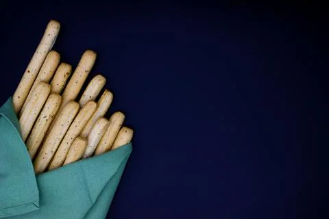 Breadsticks on dark background Foto stock