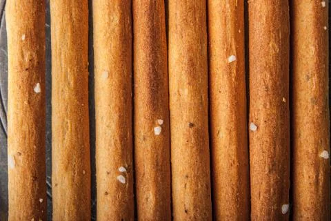 Breadsticks with salt background Stock Photos