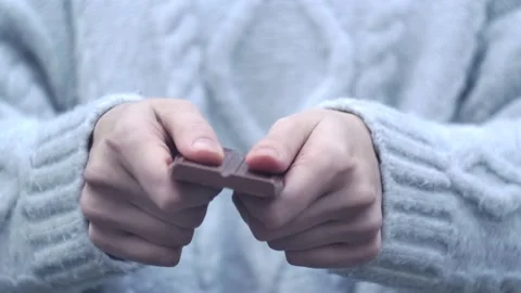 Break A Bar Of Chocolate. Slow Motion Stock Footage 147410383