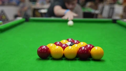 The break of blackball Pool balls on a green pool table Stock Footage 297809604