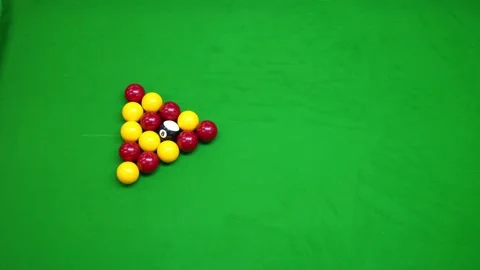 The break of blackball Pool balls on a green pool table from above Stock Footage 297810541