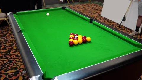 The break of blackball Pool balls on a green pool table Stock Footage 299706980