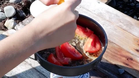 Break chicken eggs into a frying pan and fry them. Stock-Footage 139984417