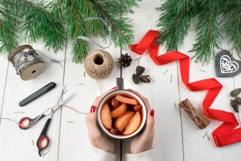 Break with a Cup of mulled wine while preparing for the Christmas holidays. Stock Photos