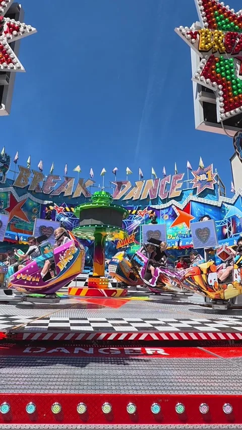 Break dance carousel ride spinning at funfair Stock Footage 338170672