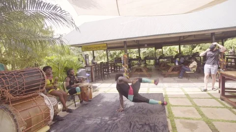 Break dancers perform for tourism on a stage in Jamaica. Stock Footage 109555565