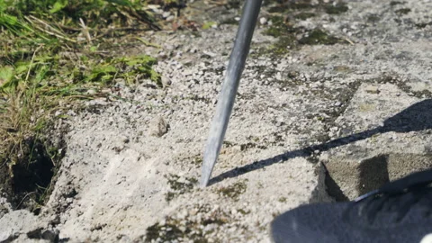 Break up, drill concrete with jackhammer, close up tracking shot. Stock Footage 133612637
