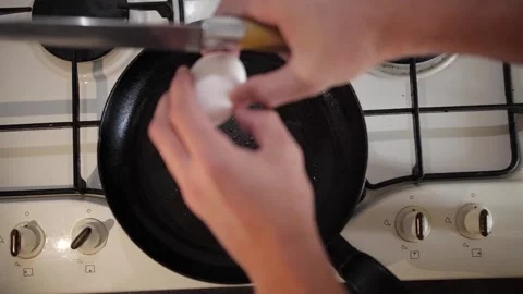 Break the egg and make scrambled eggs Stock Footage 150481981