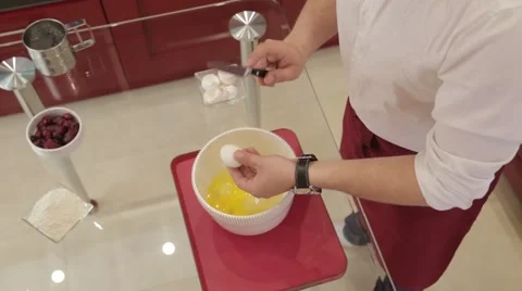 Break egg in a bowl with the flour Stock Footage 48812696