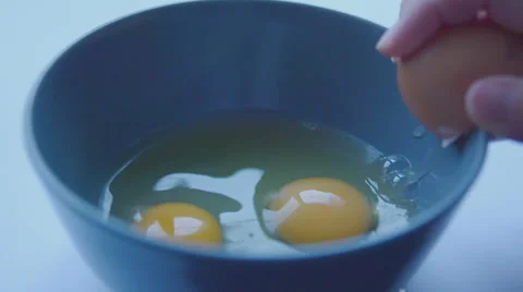 Break egg slow motion Stock Footage 57638968