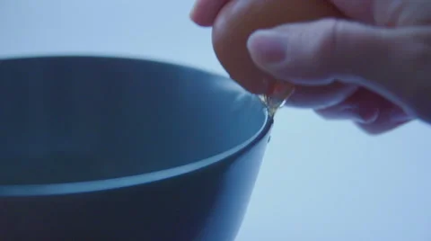 Break egg slow motion Stock Footage 57638969