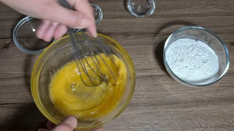 Break eggs and mix eggs Stock Footage 164155744