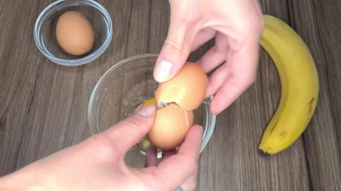 Break Eggs Into A Bowl Stock Footage 171539293