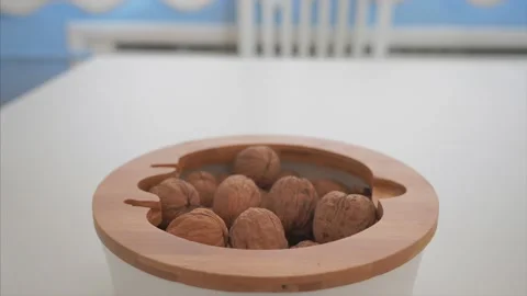Break a hard walnut slow motion Stock-Footage 131108972