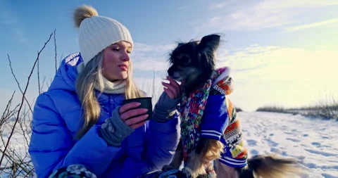 A break for a hot beverage during a winter hike. Stock Footage 253228219