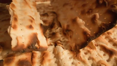 Break off a piece of matzah Stock Footage 237275346
