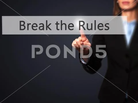 Break the Rules - Businesswoman pressing modern buttons on a vi Stock Photos