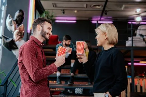 Break time in a modern office center charismatic and multiethnic workers Stock Photos