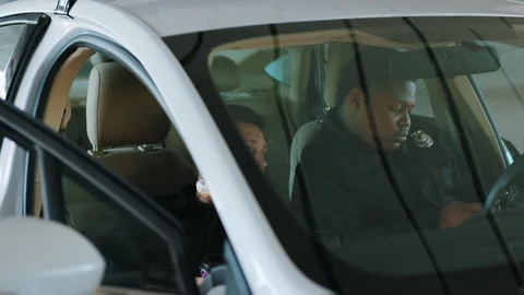 Break time young two policeme eating donut smile siting patrol car help happy Stock Footage 112999787