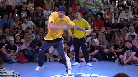 Breakdance Battle Competition. A b-boy performing outside Stock Footage 121239420