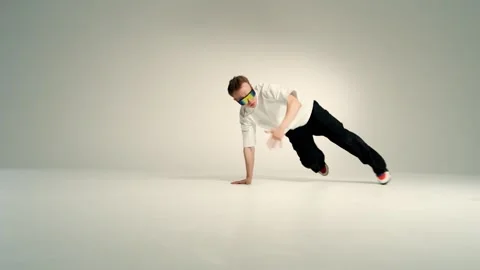 Breakdance One-Handed Freeze in Studio Stock Footage 345601422