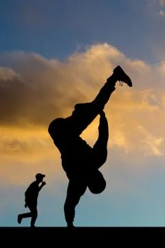 Breakdance performer at sunset Illustrazione stock