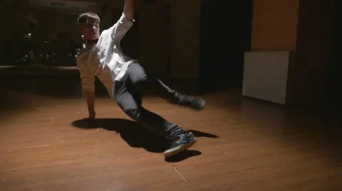 Breakdance in slow motion - Young break dancer showing his freestyle choreograph Stock Footage 46129333