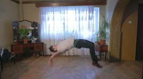 Breakdance in slow motion - Young break dancer showing his freestyle choreograph Stock Footage 46958316