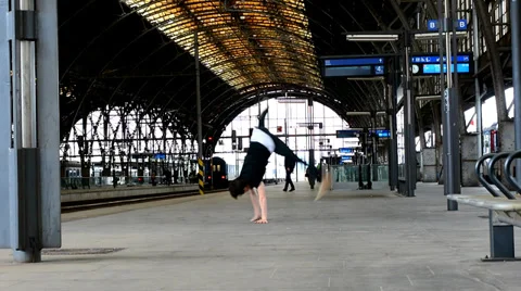 Breakdancer dancing breakdance at the train station in Prague Stock Footage 38334841