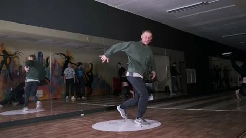 Breakdancer dancing hip hop, break dance. Dancing school. Slow motion Stock Footage 131878756