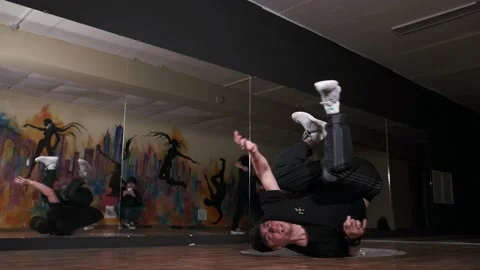 Breakdancer dancing hiphop, break dance. Dancing school. Slow motion Stock Footage 131878806