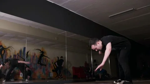 Breakdancer dancing hiphop, break dance. Dancing school. Slow motion Stock Footage 131878861