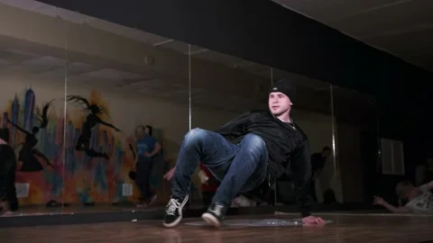 Breakdancer dancing hiphop, break dance. Dancing school. Slow motion Stock Footage 131878927
