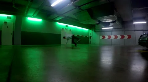 Breakdancer in the garage, 4K Stock Footage 45260662