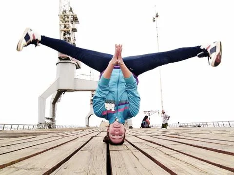 Breakdancer handstanding with head Stock Photos