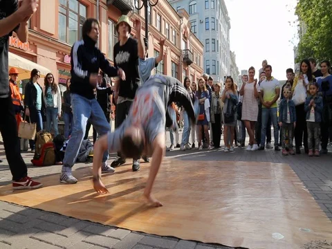 Breakdancer male expressive performance summer street Stock Footage 85142177