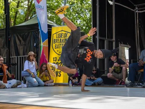 Breakdancer performing a dynamic floor move Stock Photos