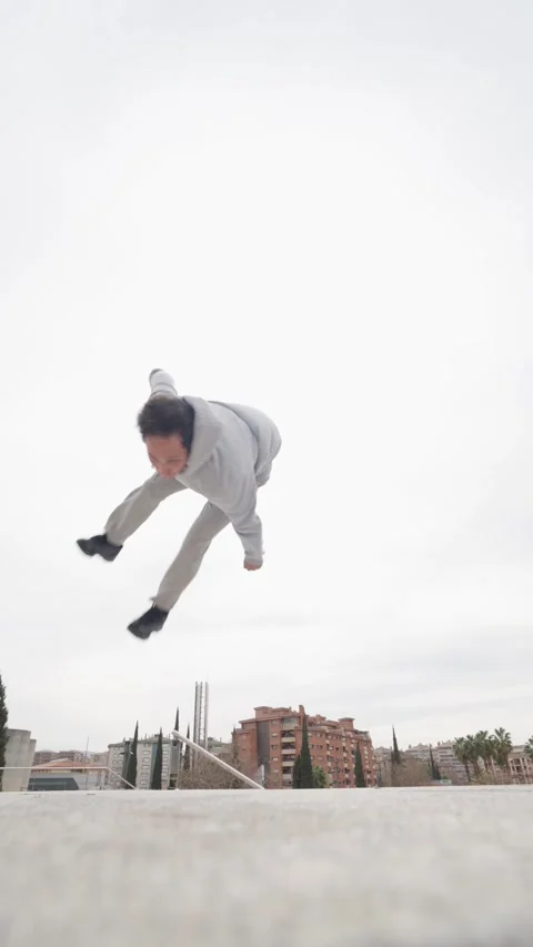 Breakdancer performing a freeze in urban environment Stock Footage 305911113