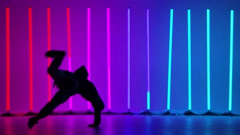 Breakdancing acrobatic elements performed by a professional dancer against the Stock Footage 144421087