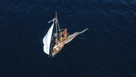 Breakdown and rescue of a small sailboat Stock Footage 251367200