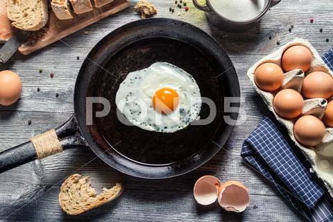 Breakfast and preparing for frying eggs Stock Photos
