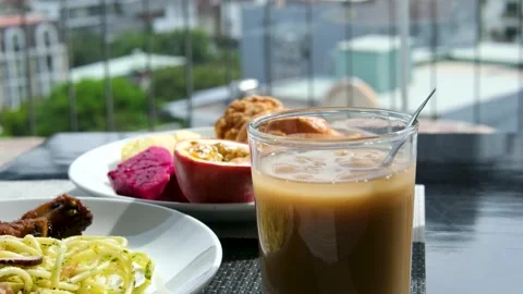 Breakfast in Asia: omelette, fried egg, noodles, pasta, greens, vegetables Stock Footage 329281657