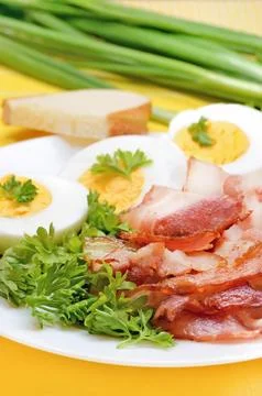 Breakfast with bacon and eggs Stock Photos