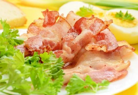 Breakfast with bacon and eggs Stock Photos