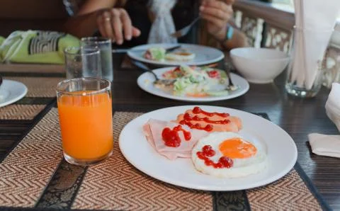 Breakfast with bacon, fried egg Stock Photos