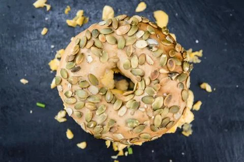 Breakfast Bagel with fried Eggs (selective focus) Stock Photos